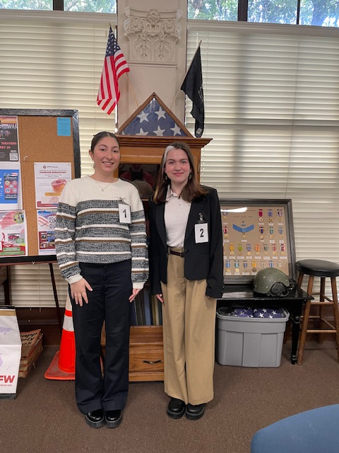 2025 U.S. Constitution Oratorical District contestant winner, Sylvie Karlstrand (right) and second place winner Megan (left).