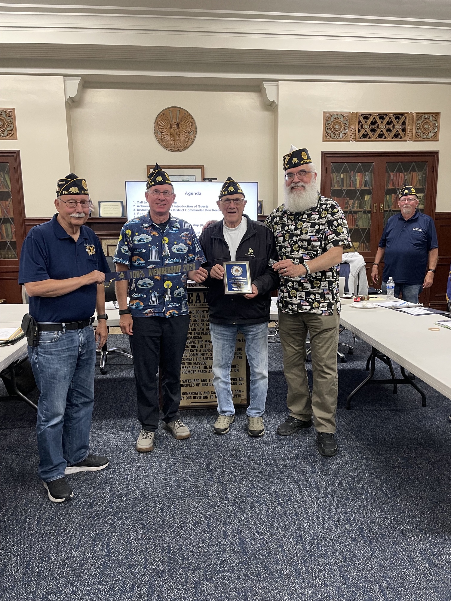 District Commander Don Reed presents Post 647 First Vice Commander, Sam Moriana with
an Achievement Award plaque for obtaining 100% Post membership renewal for 2026